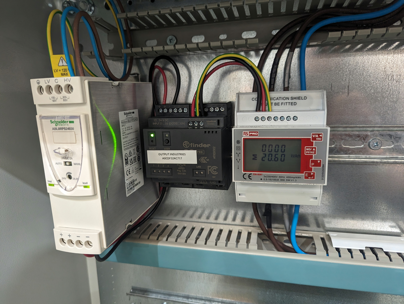 An Arduino Opta wired to an energy meter